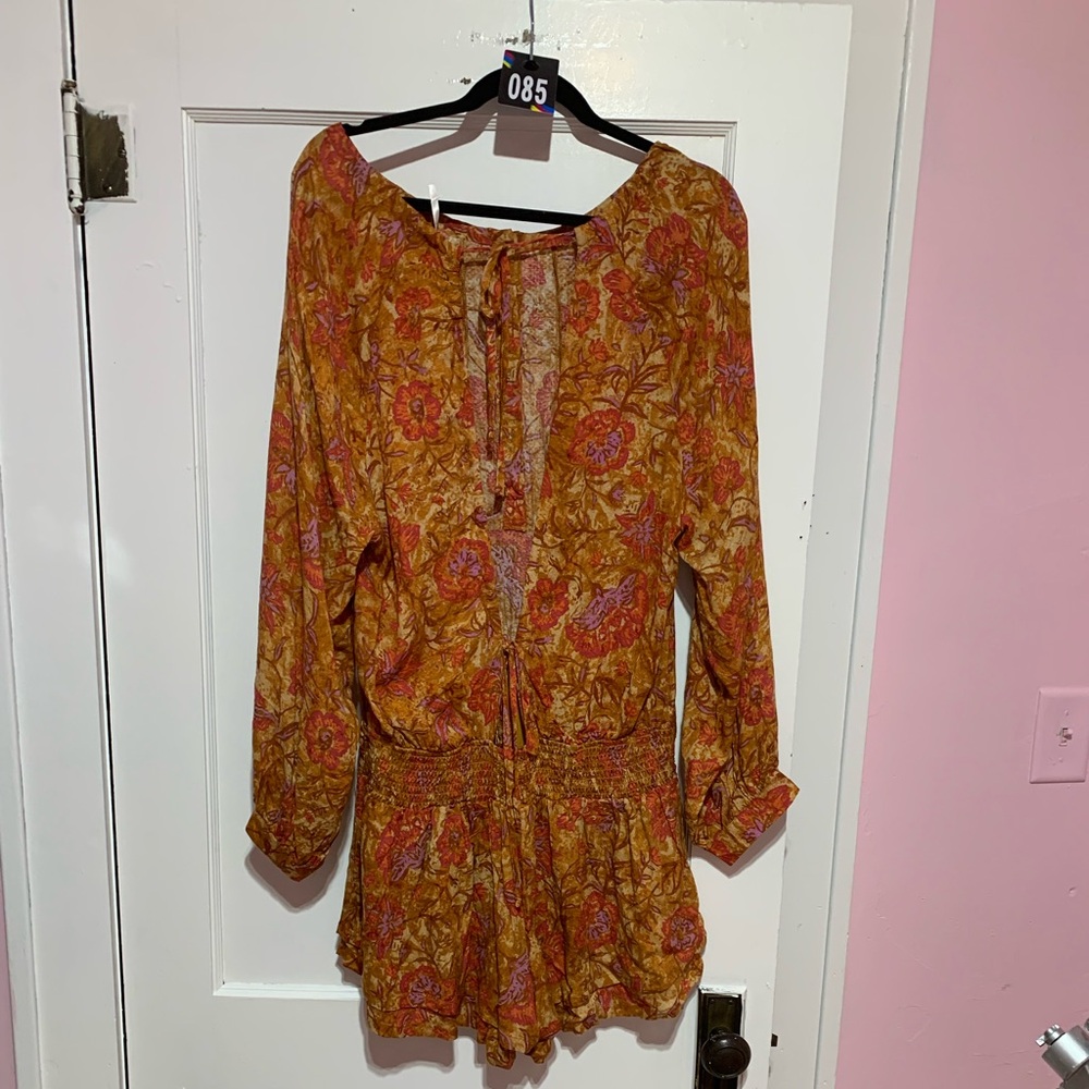 New with tags free people romper

Size medium